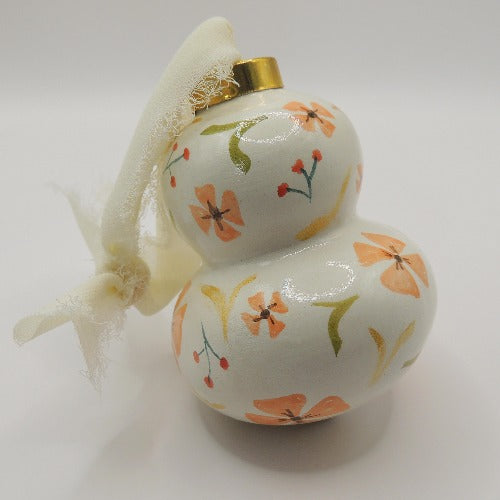 peach on earth hand painted ornament by beverly gurganus