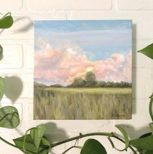 original landscape oil painting with colorful sunrise over trees and fresh green grass.